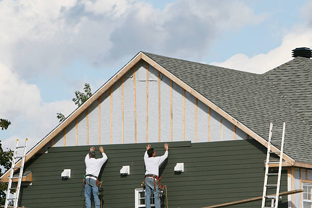 Professional Emergency Siding Repair technician working in Harrisville, PA